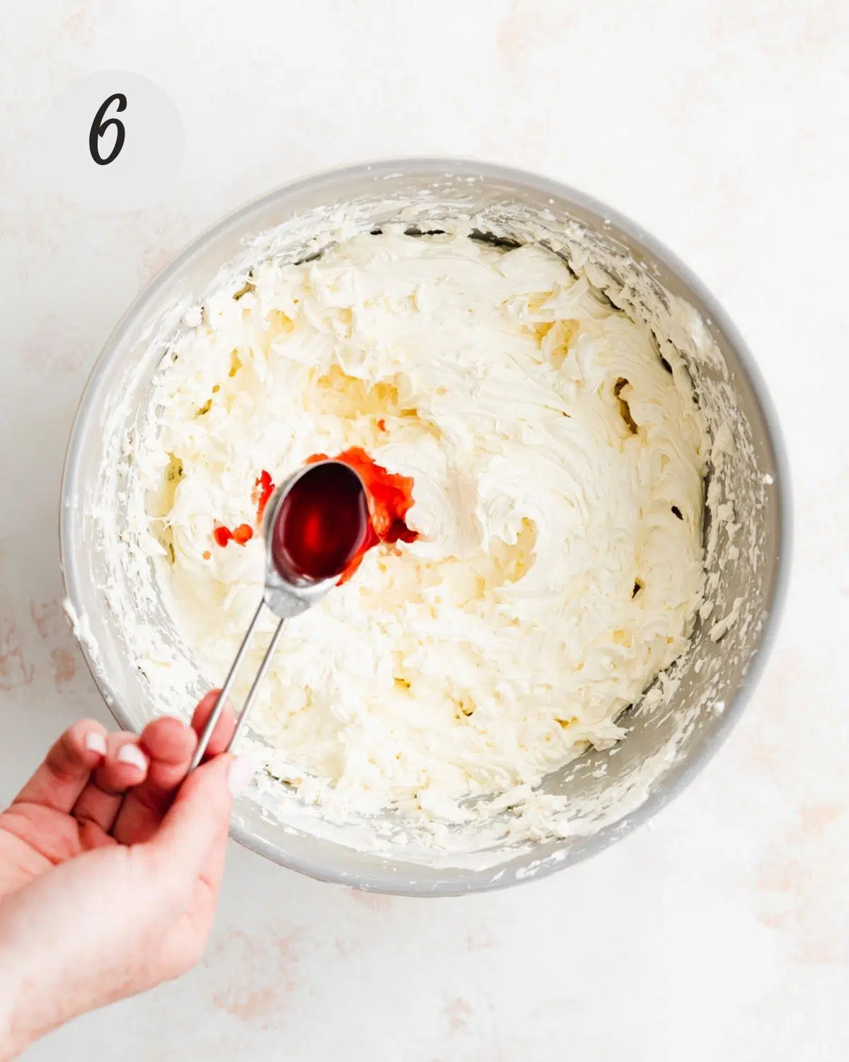 making vegan champagne strawberry frosting.